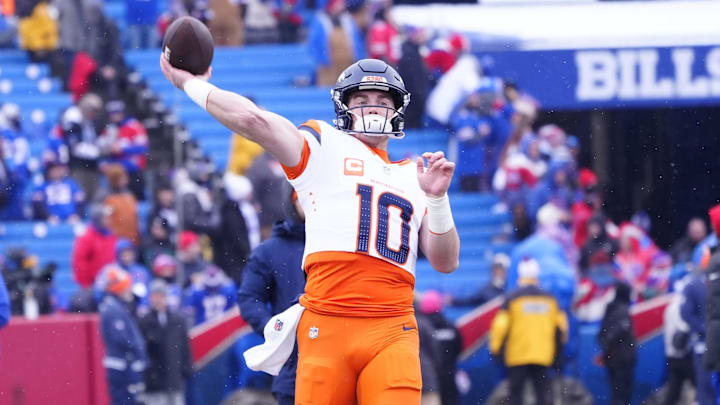 Jan 12, 2025; Orchard Park, New York, USA; Denver Broncos quarterback Bo Nix (10) warms up before a game against the Buffalo Bills in an AFC wild card game at Highmark Stadium. Jan 12, 2025; Orchard Park, New York, USA; Denver Broncos quarterback Bo Nix (10) warms up before a game against the Buffalo Bills in an AFC wild card game at Highmark Stadium.