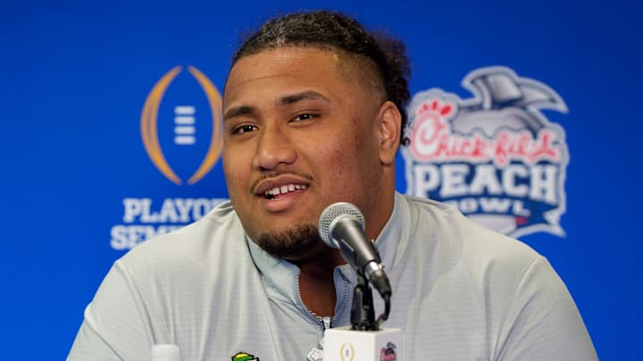 Oregon center Iapani Laloulu speaks during a media day as the Oregon Ducks arrive on Jan. 7, 2025, in Atlanta, Georgia ahead of the Peach Bowl at Mercedes-Benz Stadium.