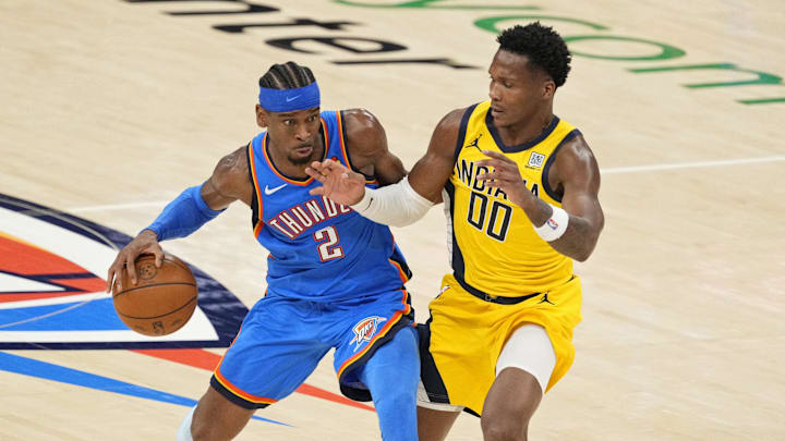 Jun 8, 2025; Oklahoma City, Oklahoma, USA; Oklahoma City Thunder guard Shai Gilgeous-Alexander (2) dribbles the ball against Indiana Pacers guard Bennedict Mathurin (00) during the second half during game two of the 2025 NBA Finals at Paycom Center. Mandatory Credit: Kyle Terada-Imagn Images Jun 8, 2025; Oklahoma City, Oklahoma, USA; Oklahoma City Thunder guard Shai Gilgeous-Alexander (2) dribbles the ball against Indiana Pacers guard Bennedict Mathurin (00) during the second half during game two of the 2025 NBA Finals at Paycom Center. Mandatory Credit: Kyle Terada-Imagn Images
