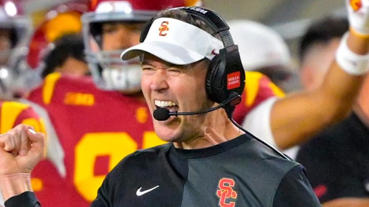 Oct 11, 2025; Los Angeles, California, USA; USC Trojans head coach Lincoln Riley celebrates after kicker Ryon Sayeri (48) hit a 54-yard field goal in the second half against the Michigan Wolverines at United Airlines Field at the Los Angeles Memorial Coliseum. Mandatory Credit: Jayne Kamin-Oncea-Imagn Images Oct 11, 2025; Los Angeles, California, USA; USC Trojans head coach Lincoln Riley celebrates after kicker Ryon Sayeri (48) hit a 54-yard field goal in the second half against the Michigan Wolverines at United Airlines Field at the Los Angeles Memorial Coliseum. Mandatory Credit: Jayne Kamin-Oncea-Imagn Images