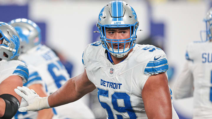 Detroit Lions offensive tackle Giovanni Manu (59) blocks during the second half against the New York Giants at MetLife Stadium.