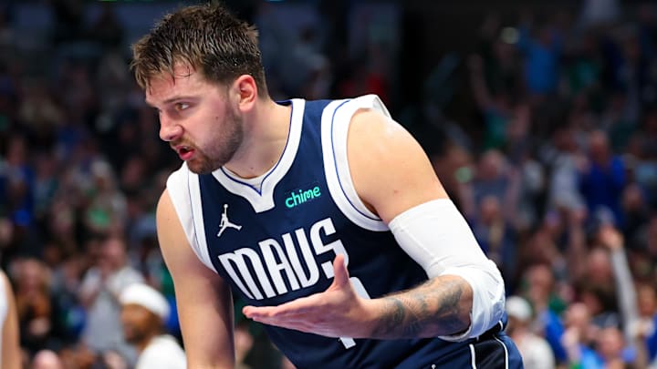Mar 17, 2024; Dallas, Texas, USA;  Dallas Mavericks guard Luka Doncic (77) reacts after scoring during the second half against the Denver Nuggets at American Airlines Center. Mandatory Credit: Kevin Jairaj-Imagn Images