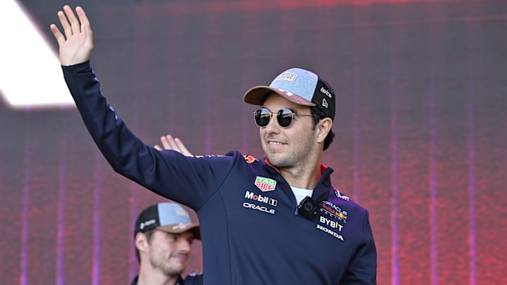 Oct 19, 2024; Austin, Texas, USA; Oracle Red Bull Racing driver Sergio Perez (11) of Team Mexico waves to the crowd during a fan forum before the Sprint Race in the 2024 Formula One US Grand Prix at Circuit of the Americas. Mandatory Credit: Jerome Miron-Imagn Images Oct 19, 2024; Austin, Texas, USA; Oracle Red Bull Racing driver Sergio Perez (11) of Team Mexico waves to the crowd during a fan forum before the Sprint Race in the 2024 Formula One US Grand Prix at Circuit of the Americas. Mandatory Credit: Jerome Miron-Imagn Images