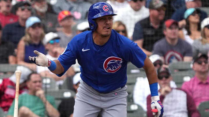 Mar 3, 2025; Salt River Pima-Maricopa, Arizona, USA; Chicago Cubs second baseman Nicky Lopez hits a double against the Arizona Diamondbacks in the second inning at Salt River Fields at Talking Stick