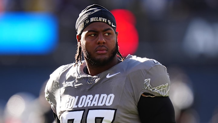 Nov 16, 2024; Boulder, Colorado, USA; Colorado Buffaloes offensive tackle Jordan Seaton (77) looks on before the game against the Utah Utes at Folsom Field. Mandatory Credit: Ron Chenoy-Imagn Images
