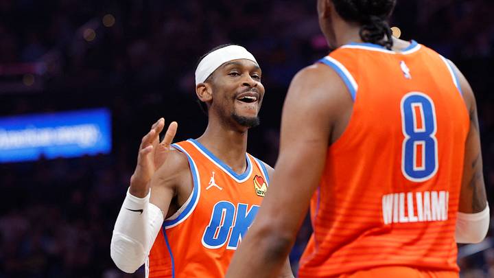 Nov 28, 2025; Oklahoma City, Oklahoma, USA; Oklahoma City Thunder guard Shai Gilgeous-Alexander (2) high fives guard Jalen Williams (8) after scoring against the Phoenix Suns during the second half at Paycom Center. Mandatory Credit: Alonzo Adams-Imagn Images