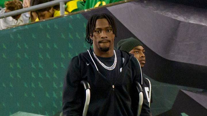 Oregon wide receiver Jeremiah McClellan walks on the field in a boot as the Oregon Ducks host the Portland State Vikings on Sept. 18, 2026, at Autzen Stadium in Eugene, Oregon