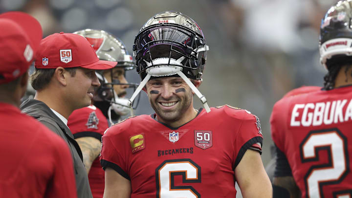 Sep 15, 2025; Houston, Texas, USA; Tampa Bay Buccaneers quarterback Baker Mayfield (6) smiles on the field before the game against the Houston Texans at NRG Stadium. Mandatory Credit: Troy Taormina-Imagn Images