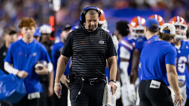 Oct 5, 2024; Gainesville, Florida, USA; Florida Gators head coach Billy Napier walks on the sideline against the UCF Knights during the first half at Ben Hill Griffin Stadium. Mandatory Credit: Matt Pendleton-Imagn Images