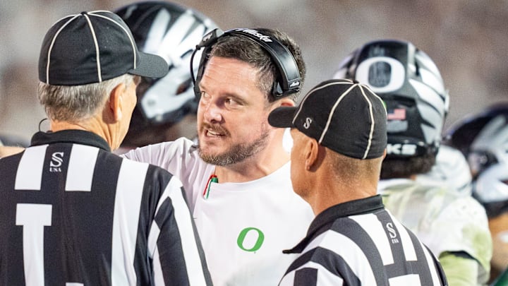 Oregon head coach Dan Lanning talks to the officials in the fourth quarter as the Oregon Ducks face the Penn State Nittany Lions on Sept. 27, 2025, at Beaver Stadium in University Park, Pennsylvania. Oregon head coach Dan Lanning talks to the officials in the fourth quarter as the Oregon Ducks face the Penn State Nittany Lions on Sept. 27, 2025, at Beaver Stadium in University Park, Pennsylvania.