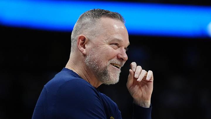 Mar 28, 2025; Denver, Colorado, USA; Denver Nuggets head coach Michael Malone  reacts in the second half against the Utah Jazz at Ball Arena. Mandatory Credit: Ron Chenoy-Imagn Images