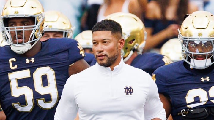 Notre Dame head coach Marcus Freeman takes the field with his team before playing Purdue at Notre Dame Stadium.