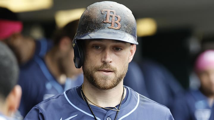 Sep 24, 2024; Detroit, Michigan, USA;  Tampa Bay Rays second baseman Brandon Lowe (8) receives congratulations from teammates after he hits a home run in the ninth inning against the Detroit Tigers at Comerica Park. Mandatory Credit: Rick Osentoski-Imagn Images