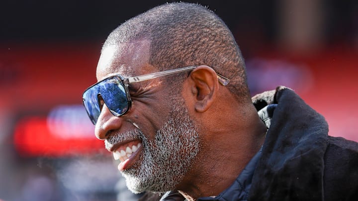 Dec 21, 2025; Cleveland, Ohio, USA;  Legendary  football and baseball player and father of Cleveland Browns quarterback Shedeur Sanders, Deion Sanders on the sidelines prior to a game against the Buffalo Bills at Huntington Bank Field. Credit: Scott Galvin-Imagn Images