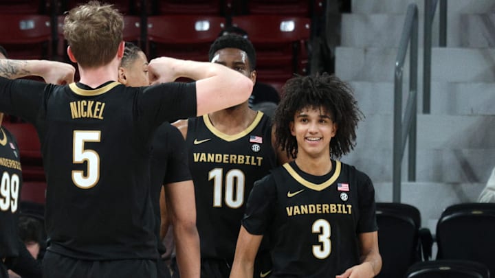 Jan 24, 2026; Starkville, Mississippi, USA; Vanderbilt Commodores forward Tyler Nickel (5) flexes at guard Tyler Tanner (3) after a basket during the second half against the Mississippi State Bulldogs at Humphrey Coliseum. Mandatory Credit: Petre Thomas-Imagn Images