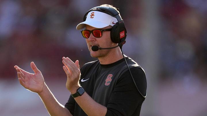 Aug 30, 2025; Los Angeles, California, USA; Southern California Trojans head coach Lincoln Riley watches from the sidelines against the Missouri State Bears in the first half at United Airlines Field at Los Angeles Memorial Coliseum. Mandatory Credit: Kirby Lee-Imagn Images