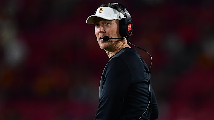 Sep 20, 2025; Los Angeles, California, USA; Southern California Trojans head coach Lincoln Riley watches game action against the Michigan State Spartans during the second half at the Los Angeles Memorial Coliseum. Mandatory Credit: Gary A. Vasquez-Imagn Images