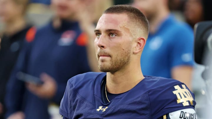 Sep 13, 2025; South Bend, Indiana, USA; Notre Dame Fighting Irish quarterback CJ Carr (13) looks on during the first half against the Texas A&M Aggies at Notre Dame Stadium. 