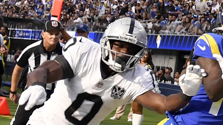 Oct 20, 2024; Inglewood, California, USA; Los Angeles Rams wide receiver Tyler Johnson (18) eyes the ball against Las Vegas Raiders cornerback Jakorian Bennett (0) to attempt to catch the ball during the second half at SoFi Stadium. Mandatory Credit: Alex Gallardo-Imagn Images Oct 20, 2024; Inglewood, California, USA; Los Angeles Rams wide receiver Tyler Johnson (18) eyes the ball against Las Vegas Raiders cornerback Jakorian Bennett (0) to attempt to catch the ball during the second half at SoFi Stadium. Mandatory Credit: Alex Gallardo-Imagn Images