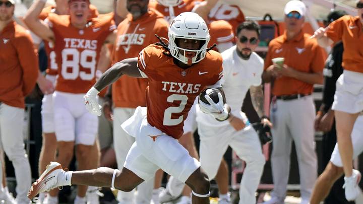 Texas Longhorns running back Hollywood Smothers (2) runs for forty-five yards during the first quarter against the Texas State Bobcats at Darrell K Royal-Texas Memorial Stadium.