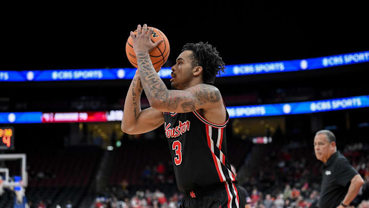 Dec 20, 2025; Newark, New Jersey, USA; Houston Cougars guard Ramon Walker Jr. (3) shoots the ball against the Arkansas Razorbacks during the second half at Prudential Center. Mandatory Credit: John Jones-Imagn Images