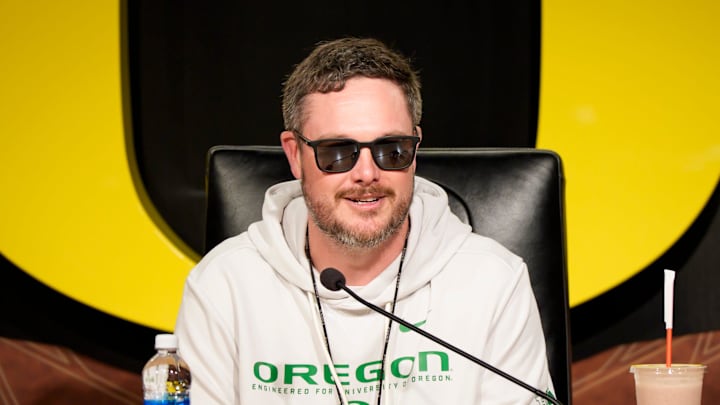 Oregon head coach Dan Lanning speaks from the podium at the Hatfield-Dowlin Complex on the first day of spring practice for the Oregon Ducks on March 12, 2026, in Eugene, Oregon.