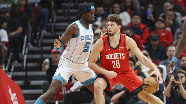 Nov 1, 2023; Houston, Texas, USA; Houston Rockets center Alperen Sengun (28) controls the ball as Charlotte Hornets center Mark Williams (5) defends during the second quarter at Toyota Center. Mandatory Credit: Troy Taormina-USA TODAY Sports Nov 1, 2023; Houston, Texas, USA; Houston Rockets center Alperen Sengun (28) controls the ball as Charlotte Hornets center Mark Williams (5) defends during the second quarter at Toyota Center. Mandatory Credit: Troy Taormina-USA TODAY Sports