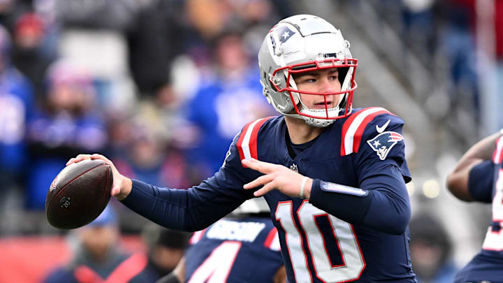 Jan 5, 2025; Foxborough, Massachusetts, USA; New England Patriots quarterback Drake Maye (10) looks to throw against the Buffalo Bills during the first half at Gillette Stadium. Mandatory Credit: Brian Fluharty-Imagn Images