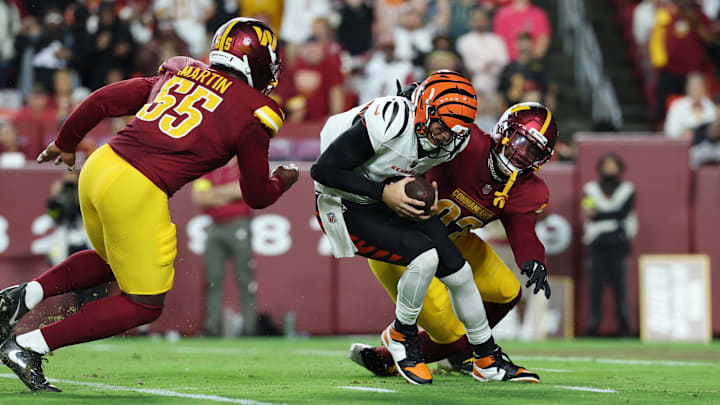 Joe Burrow looked like he was running for his life at times during Monday's preseason game between the Bengals and Commanders.