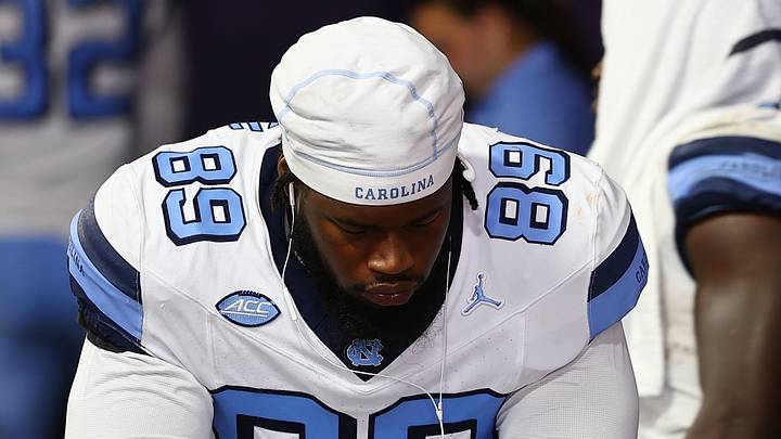 Sep 19, 2026; Clemson, South Carolina, USA;  University of North Carolina Tar Heels players wait during a lightning delay against Clemson Tigers at Memorial Stadium.  Mandatory Credit: Ashley Tumlin-Imagn Images