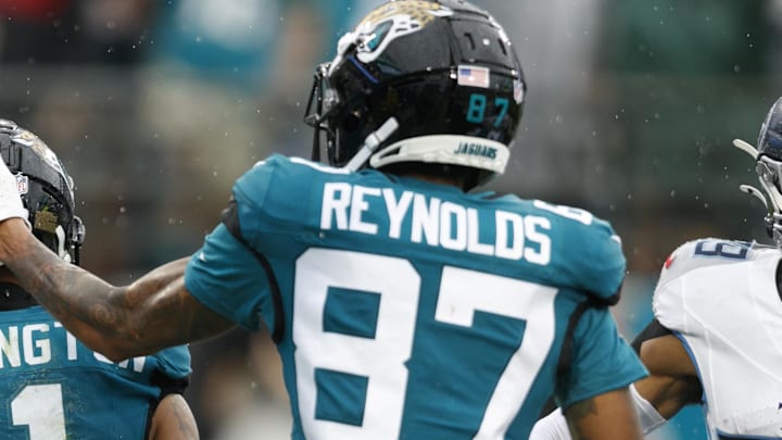 Dec 29, 2024; Jacksonville, Florida, USA; Jacksonville Jaguars wide receiver Parker Washington (11) and wide receiver Josh Reynolds (87) celebrate a touchdown against the Tennessee Titans during the second quarter at EverBank Stadium. Mandatory Credit: Morgan Tencza-Imagn Images
