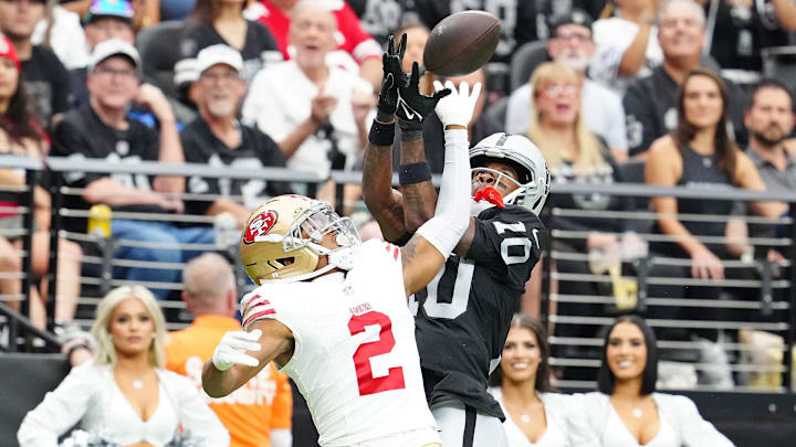Aug 16, 2025; Paradise, Nevada, USA; San Francisco 49ers cornerback Deommodore Lenoir (2) breaks up a pass intended for Las Vegas Raiders wide receiver Dont'e Thornton Jr. (10) during the first quarter at Allegiant Stadium. Mandatory Credit: Stephen R. Sylvanie-Imagn Images Aug 16, 2025; Paradise, Nevada, USA; San Francisco 49ers cornerback Deommodore Lenoir (2) breaks up a pass intended for Las Vegas Raiders wide receiver Dont'e Thornton Jr. (10) during the first quarter at Allegiant Stadium. Mandatory Credit: Stephen R. Sylvanie-Imagn Images