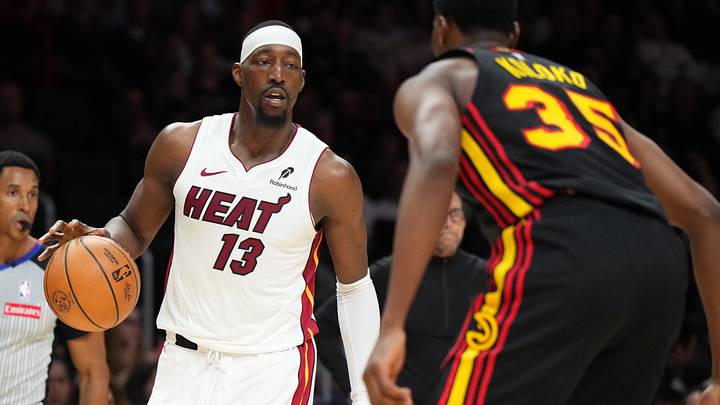Apr 12, 2026; Miami, Florida, USA; Miami heat forward Bam Adebayo (13) dribbles against Atlanta Hawks center Christian Koloko (35) during the second half at Kaseya Center. Mandatory Credit: Jim Rassol-Imagn Images Apr 12, 2026; Miami, Florida, USA; Miami heat forward Bam Adebayo (13) dribbles against Atlanta Hawks center Christian Koloko (35) during the second half at Kaseya Center. Mandatory Credit: Jim Rassol-Imagn Images