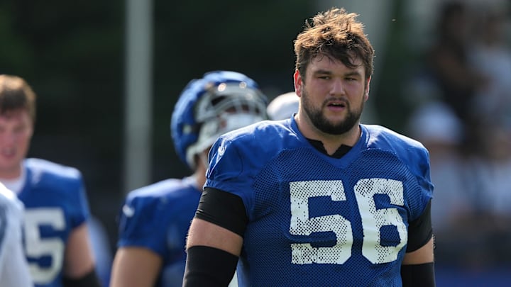 Indianapolis Colts guard Quenton Nelson (56) walks onto the field during the first day of the Indianapolis Colts’ training camp Thursday, July 25, 2024, at Grand Park Sports Complex in Westfield.