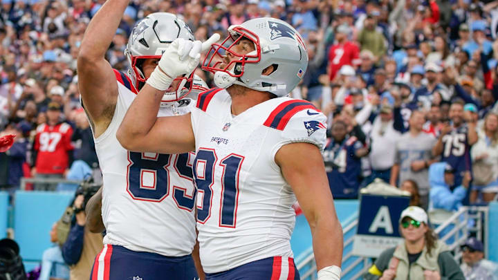 Oct 19, 2025; Nashville, Tennessee, USA; New England Patriots tight end Austin Hooper (81) celebrates his touchdown during the second quarter against the Tennessee Titans at Nissan Stadium. Mandatory Credit: Andrew Nelles-USA TODAY Network via Imagn Images