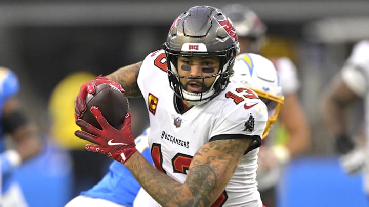 Dec 15, 2024; Inglewood, California, USA; Tampa Bay Buccaneers wide receiver Mike Evans (13) runs for a touchdown on a 35 yard pass play in the second half against the Los Angeles Chargers at SoFi Stadium. Mandatory Credit: Jayne Kamin-Oncea-Imagn Images Dec 15, 2024; Inglewood, California, USA; Tampa Bay Buccaneers wide receiver Mike Evans (13) runs for a touchdown on a 35 yard pass play in the second half against the Los Angeles Chargers at SoFi Stadium. Mandatory Credit: Jayne Kamin-Oncea-Imagn Images