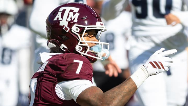 Nov 22, 2025; College Station, Texas, USA; Texas A&M Aggies wide receiver KC Concepcion (7) signals first down in the first half of game against the Samford Bulldogs at Kyle Field. Mandatory Credit: Joseph Buvid-Imagn Images