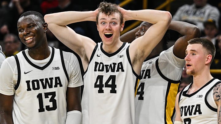 Dec 30, 2024; Iowa City, Iowa, USA; Iowa Hawkeyes forward Riley Mulvey (44) and Iowa Hawkeyes forward Ladji Dembele (13) and Iowa Hawkeyes guard Brock Harding (2) and Iowa Hawkeyes guard Jacob Koch (10) and the Hawkeyes bench react during the second half against the New Hampshire Wildcats at Carver-Hawkeye Arena. Mandatory Credit: Jeffrey Becker-Imagn Images Dec 30, 2024; Iowa City, Iowa, USA; Iowa Hawkeyes forward Riley Mulvey (44) and Iowa Hawkeyes forward Ladji Dembele (13) and Iowa Hawkeyes guard Brock Harding (2) and Iowa Hawkeyes guard Jacob Koch (10) and the Hawkeyes bench react during the second half against the New Hampshire Wildcats at Carver-Hawkeye Arena. Mandatory Credit: Jeffrey Becker-Imagn Images