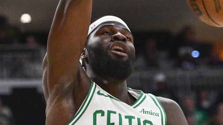 Apr 3, 2026; Milwaukee, Wisconsin, USA; Boston Celtics center Neemias Queta (88) dunks the ball against the Milwaukee Bucks in the first quarter at Fiserv Forum. Mandatory Credit: Benny Sieu-Imagn Images