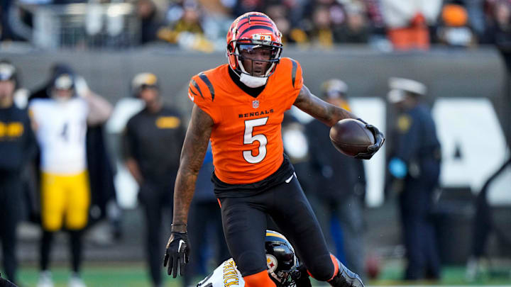 Cincinnati Bengals wide receiver Tee Higgins (5) catches a pass across the middle over Pittsburgh Steelers safety Minkah Fitzpatrick (39) in the third quarter of the NFL Week 13 game between the Cincinnati Bengals and the Pittsburgh Steelers at Paycor Stadium in downtown Cincinnati on Sunday, Dec. 1, 2024. The Steelers won 44-38.
