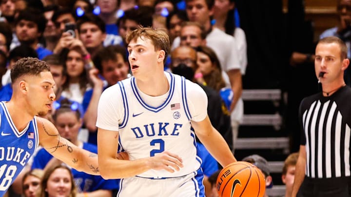 Oct 4, 2024; Durham, NC, USA; Duke Blue Devils guard Cooper Flagg (2) dribbles the ball against forward Mason Gillis (18) with the ball during Countdown to Craziness at Cameron Indoor Stadium. Mandatory Credit: Jaylynn Nash-Imagn Images Oct 4, 2024; Durham, NC, USA; Duke Blue Devils guard Cooper Flagg (2) dribbles the ball against forward Mason Gillis (18) with the ball during Countdown to Craziness at Cameron Indoor Stadium. Mandatory Credit: Jaylynn Nash-Imagn Images