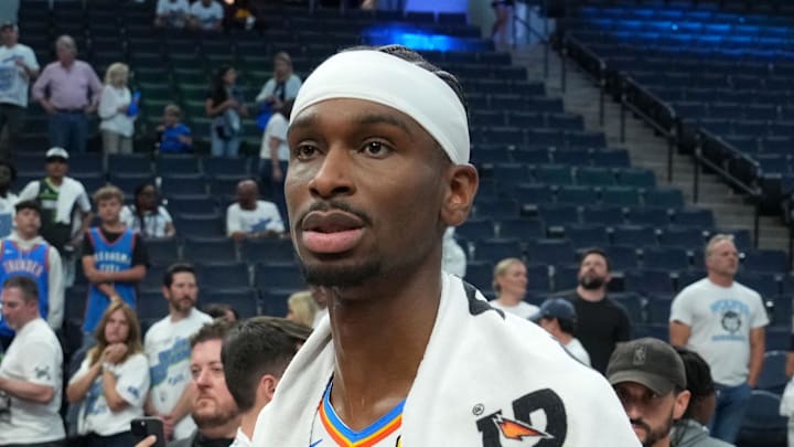 May 26, 2025; Minneapolis, Minnesota, USA; Oklahoma City Thunder guard Shai Gilgeous-Alexander (2) reacts after defeating the Minnesota Timberwolves in game four of the western conference finals for the 2025 NBA Playoffs at Target Center. Mandatory Credit: Jesse Johnson-Imagn Images