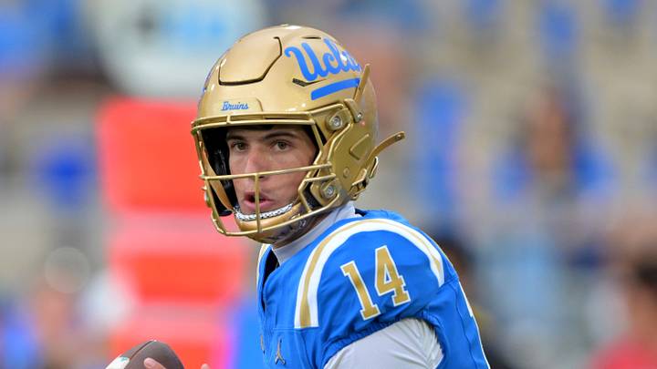 Oct 17, 2026; Pasadena, California, USA;  UCLA Bruins quarterback Ty Dieffenbach (14) passes in the first half against the Wisconsin Badgers at the Rose Bowl. Mandatory Credit: Jayne Kamin-Oncea-Imagn Images