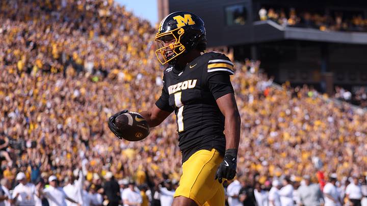 Missouri wide receiver Donovan Olugbode reacts after scoring a touchdown against Florida. Missouri wide receiver Donovan Olugbode reacts after scoring a touchdown against Florida.