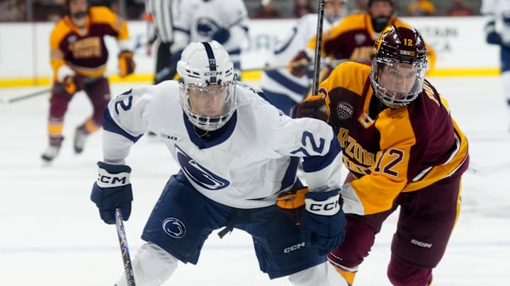 Oct 3, 2025; Tempe, AZ, USA; Penn State Gavin McKenna (72) skates against Arizona State Cullen Potter (12) during the second period at Mullett Arena. Oct 3, 2025; Tempe, AZ, USA; Penn State Gavin McKenna (72) skates against Arizona State Cullen Potter (12) during the second period at Mullett Arena.