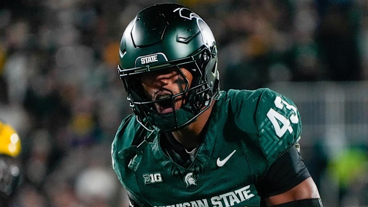 Oct 25, 2025; East Lansing, Michigan, USA; Michigan State Spartans safety Malik Spencer (43) reacts after a third down defensive play against the Michigan Wolverines during the first half at Spartan Stadium. Mandatory Credit: Brendan Mullin-Imagn Images