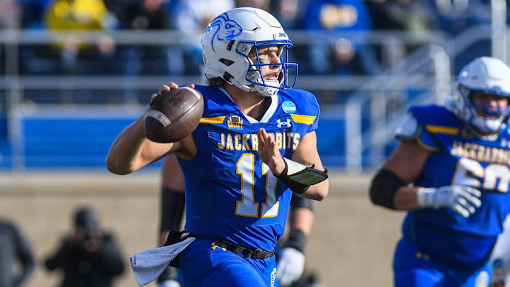 SDSU's quarterback Mark Gronowski (11) runs with the ball during a game against Mercer University on Saturday, Dec. 2, 2023, at Dana J Dykhouse Stadium in Brookings. SDSU's quarterback Mark Gronowski (11) runs with the ball during a game against Mercer University on Saturday, Dec. 2, 2023, at Dana J Dykhouse Stadium in Brookings.