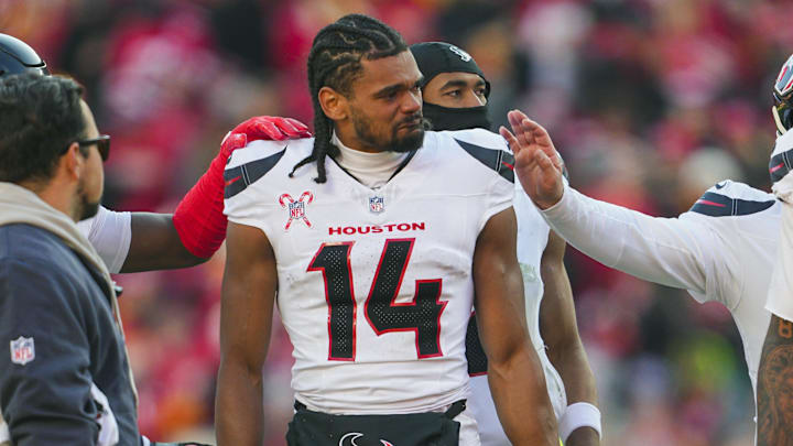 Dec 21, 2024; Kansas City, Missouri, USA; Houston Texans wide receiver Jared Wayne (14) reacts after an injury to wide receiver Tank Dell (not pictured) during the second half against the Kansas City Chiefs at GEHA Field at Arrowhead Stadium. Mandatory Credit: Jay Biggerstaff-Imagn Images Dec 21, 2024; Kansas City, Missouri, USA; Houston Texans wide receiver Jared Wayne (14) reacts after an injury to wide receiver Tank Dell (not pictured) during the second half against the Kansas City Chiefs at GEHA Field at Arrowhead Stadium. Mandatory Credit: Jay Biggerstaff-Imagn Images