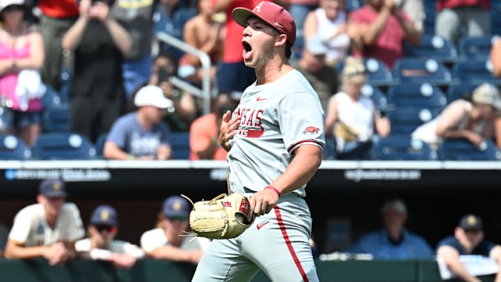 Jun 16, 2025; Omaha, Neb, USA; Arkansas Razorbacks starting pitcher Gage Wood (14) celebrates completing a no hitter against the Murray State Racers at Charles Schwab Field. Mandatory Credit: Steven Branscombe-Imagn Images
