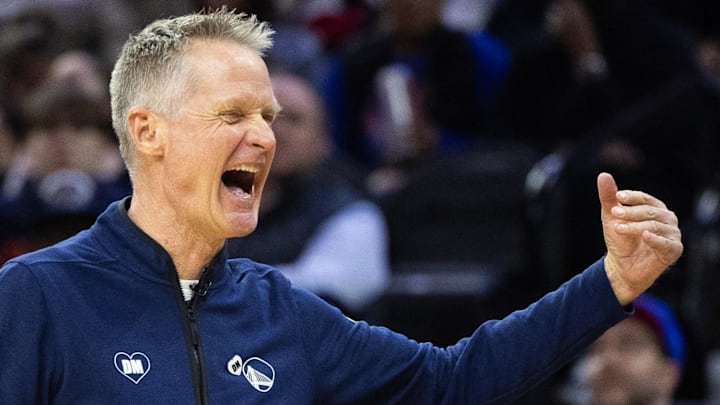 Feb 7, 2024; Philadelphia, Pennsylvania, USA; Golden State Warriors head coach Steve Kerr reacts after a score against the Philadelphia 76ers during the third quarter at Wells Fargo Center. Mandatory Credit: Bill Streicher-Imagn Images